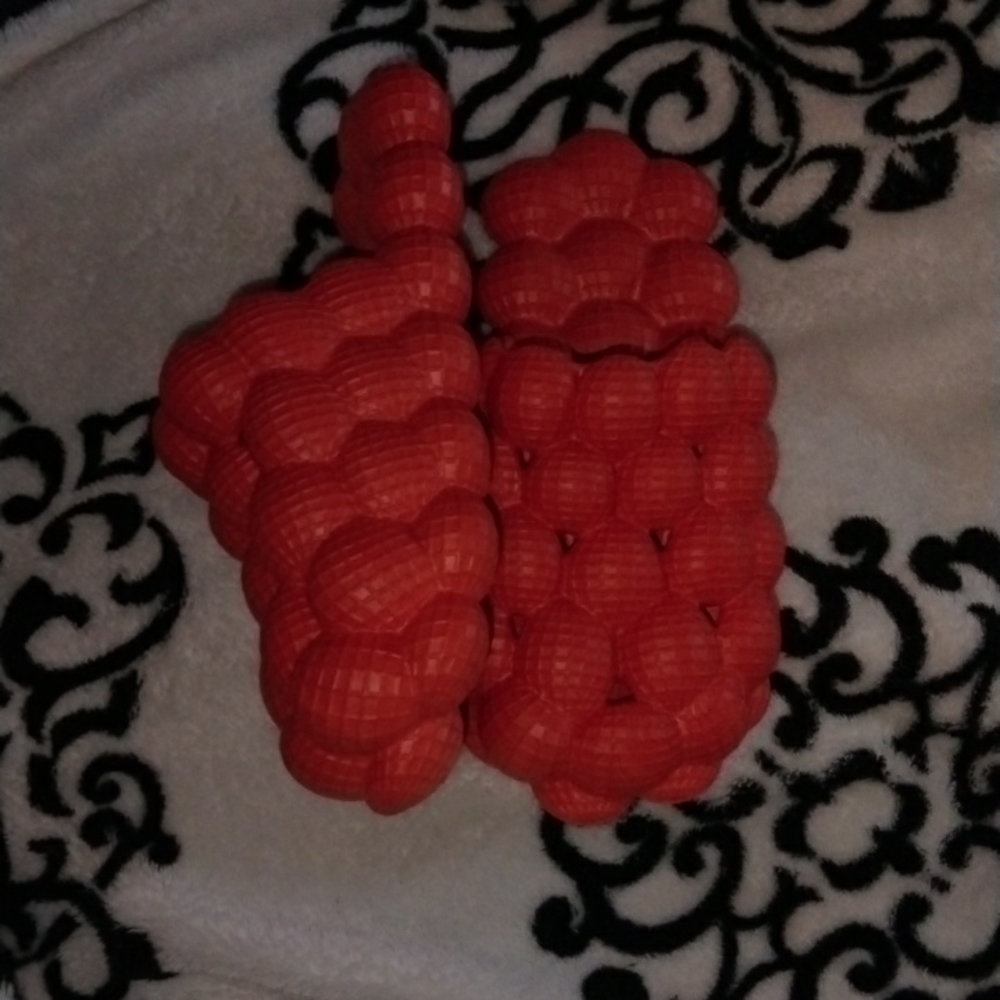 Orange massage shoes